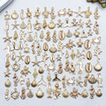 Gold-Tone Shell and Starfish Shell Charms with 29 Listed Options view 4