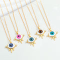 Gold Tone Spiked Eyeball Pendant Necklaces in Six Iris Colors view 1