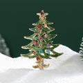 Jeweled Christmas Tree Brooch With Faceted Crystals And Polished Metal Details view 1