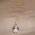 Gold and Silver Tone Blue Crystal Hamsa Eye Pendant Necklaces view 4