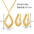 Gold Tone Gold Open Teardrop Irregular Metal Necklace and Earring Set view 5
