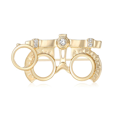 Optometry Trial Frame Brooch front view on a plain background
