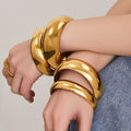 Mirror Polished Dome Bangle Gold Steel Multiple Widths view 1