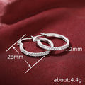 Silver Tone Thin Round Hoop Earrings with Clear Pavé Front view 4