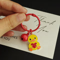 Yellow Heart-Holding Duck Keychain with Red Bell and Split Ring view 2
