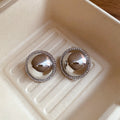 Domed Metal and Crystal Halo Stud Earrings in Two Finishes view 7