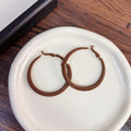Large Glossy Round Hoop Earrings in Brown and Deep Red view 6