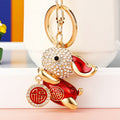 Flying Fortune Rabbit Keychains in Four Colors with Braided and Fortune Loops view 1