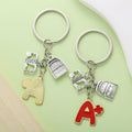 Graduation Charm Keychains Featuring Cap And Tools Across 31 Pictured Variations view 4