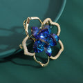 Blue Crystal Camellia Flower Brooch with Gold Tone Outline view 2