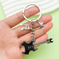 Guitar, Microphone and Saxophone Charm Keychains Featuring Red Flame Across 11 Variations view 1
