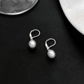 Gold and Silver White Pearl Look Drop Huggie Earrings view 4