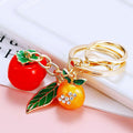 Persimmon and Orange Leaf Charm Keychains in Three Pictured Colors view 6