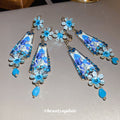 Blue Faceted Teardrop Floral Dangle Clip On Earrings view 3