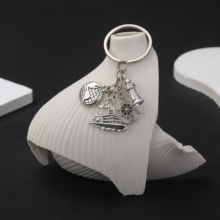 Silver Tone Ship Wheel Globe Anchor and Lifebuoy Keychains