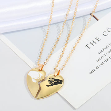 Gold Tone Broken Heart Hand Motif Pendant Necklaces in Two Designs
