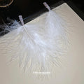 Large White Feather Statement Earrings with Silver Tone Hoops view 2