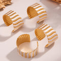 Broad Wavy Open Cuff Bracelet in Polished Gold Tone view 3