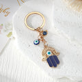 Blue Evil Eye Hamsa Hand Metal Keychains in Four Designs view 4