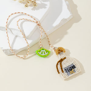 Beaded Tequila Bottle And Lime Charm On Braided Cord
