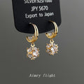Gold Double Band Huggie Earrings With Zircon Ball Drop view 1