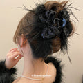 Large Black Feather Hair Claw With Sequin Bow And Loose Strands view 4