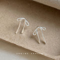 Silver Outline Bow Ribbon Polished Metal Stud Earrings view 4