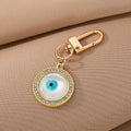 Gold and Silver Tone Crystal Round Evil Eye Clip Keychains view 2