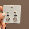 Silver Heart Stud Black Bow Embossed Heart Drop Earrings view 3