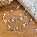 Blue and White Beaded Starfish and Shell Charm Necklace view 2