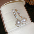 Crystal Bar and Oversized White Pearl Drop Earrings view 2