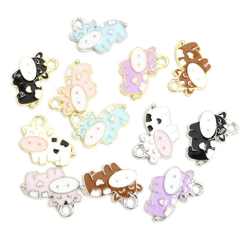 Main image 1 showing cow charms and their visible colors and details
