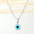 Round Evil Eye Pendant Necklaces in Ten Gold and Silver Tone Designs view 12