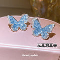 Blue Crystal Butterfly Earrings with Sparkling Stone Edges view 1