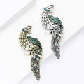 Crystal Peacock Metal Brooch with Curved Peacock Silhouette with Crystal Feather Details view 4