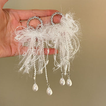 Silver Tone Feather and Crystal Cluster Statement Earrings