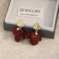 Gold Shell Top and Burgundy Petal Cluster Earrings view 2