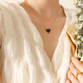 Black Crystal Heart Pendant Necklace Gold Steel Metal Frame view 1