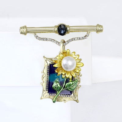 Framed Sunflower Painting Brooch With Pearl and Chain shown from the front on a white background