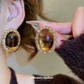 Amber Brown Oval Resin Stud Earrings with Crystal Borders view 1