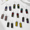 Silver Hook Black Resin Pressed Flower Earrings in Eight Designs view 1