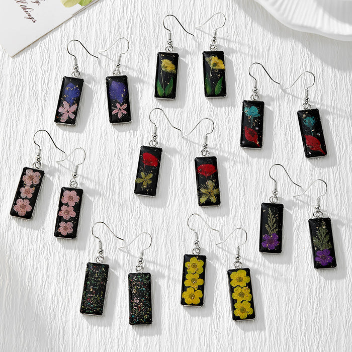 Silver Hook Black Resin Pressed Flower Earrings in Eight Designs