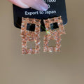 Crystal Open Rectangle Drop Earrings In Silver And Rose Gold view 7