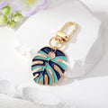 Gold Tone Enamel Monstera Leaf Clip Keychains in Five Colorways view 3