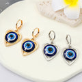 Heart Evil Eye Huggie Drop Earrings in Gold and Silver Tone view 3
