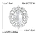 Oval Crystal Halo Brooch With Polished Metal And Sculpted Decorative Details view 6