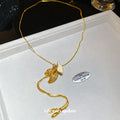 Gold Tone Flower And Ribbon Tassel Pendant Necklace view 4