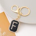 Rhinestone Initial Letter Keychain Black Enamel Gold Tone Tag view 11
