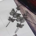 Gold Silver and Gunmetal Butterfly Cascade Earrings view 6