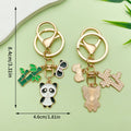 Panda Charm Keychains Featuring White Apple Across 45 Pictured Variations view 7